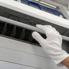 What Does a Service Man Do While Servicing Your Air Conditioner? 